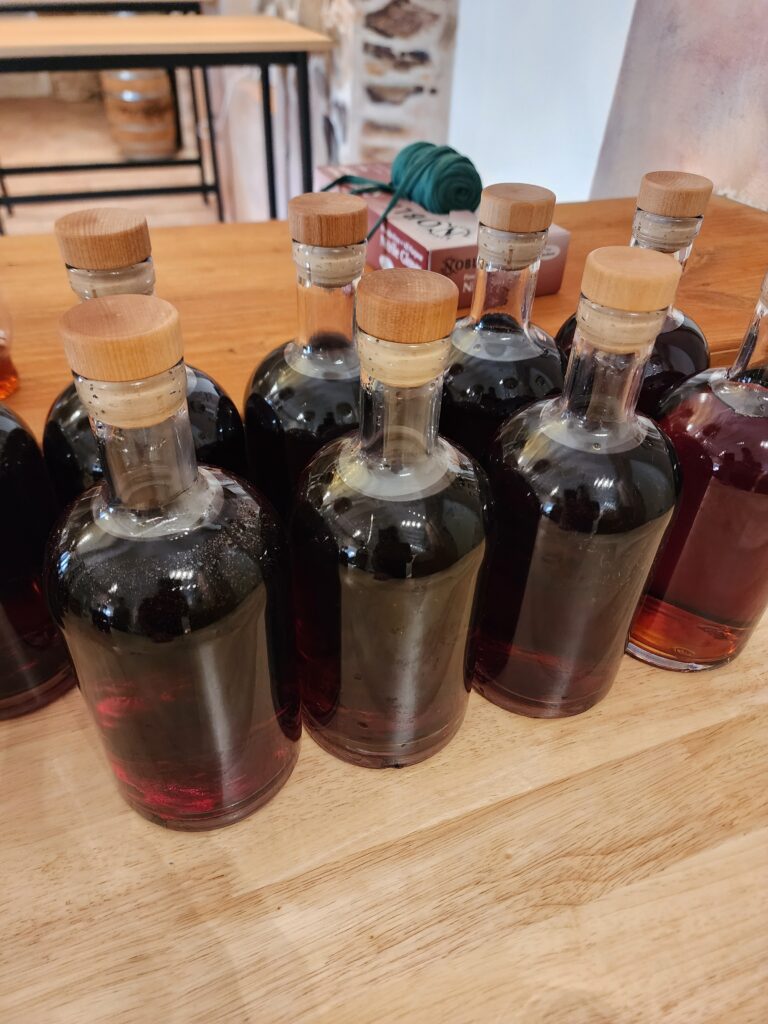 bottles of rum just filled and corked